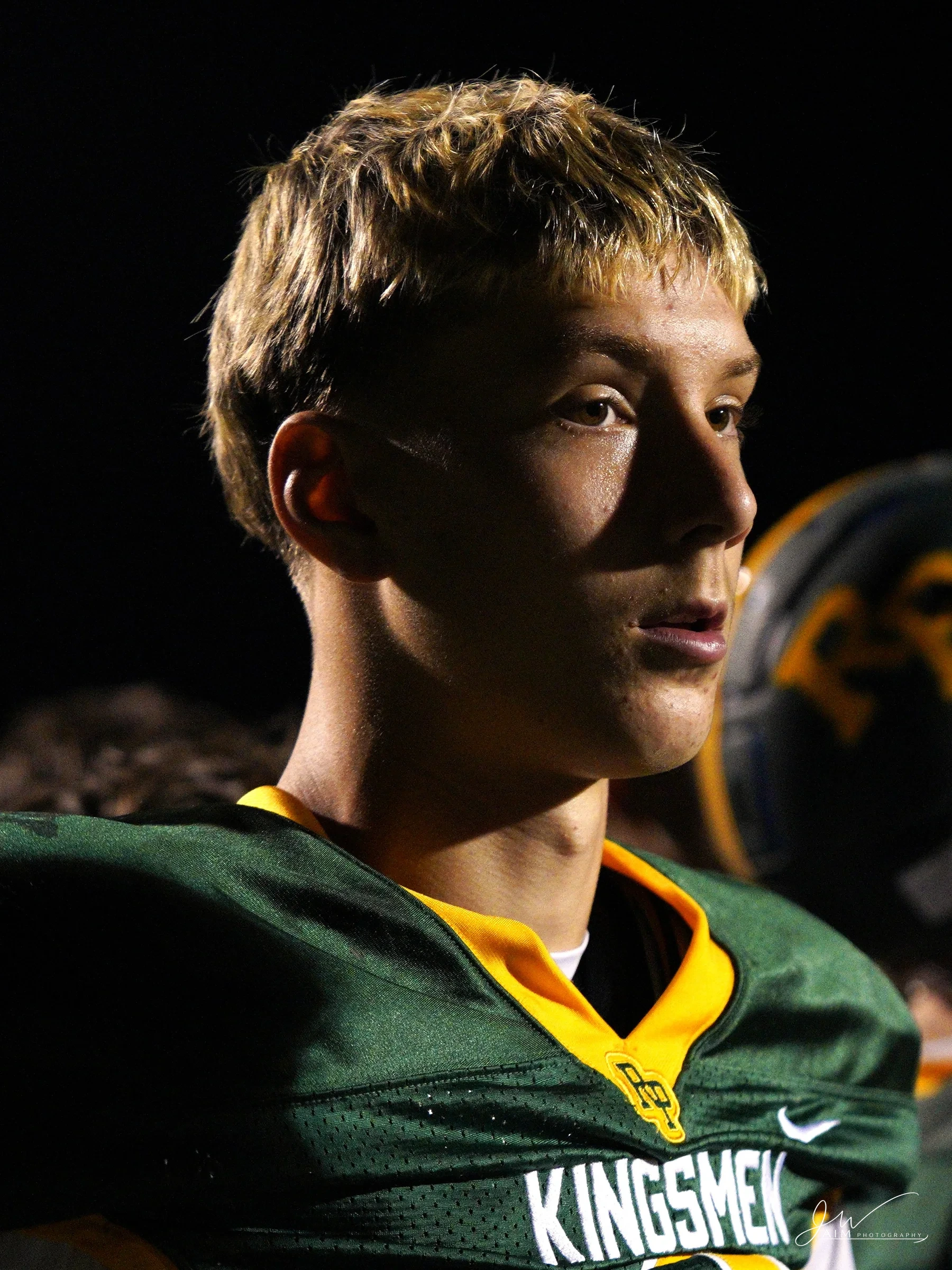 Football athlete photographed by AIM Photography